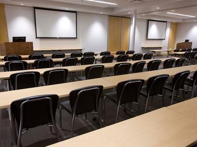 A large double classroom in the Wilder Business Center.