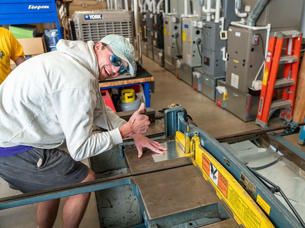 Male student working in HVAC lab