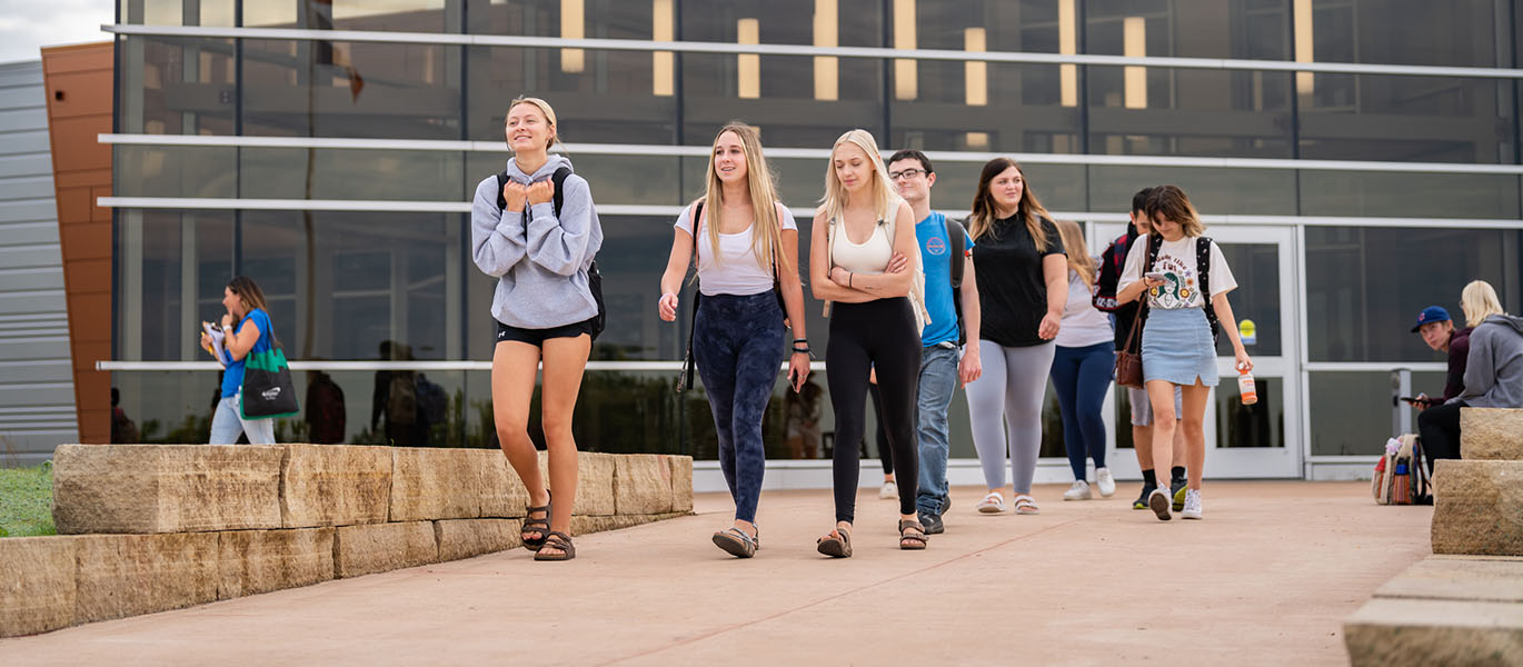 Peosta Campus students exiting the main building.