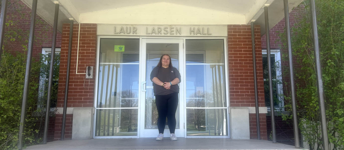 Molly Sahm stands outside Larsen Hall