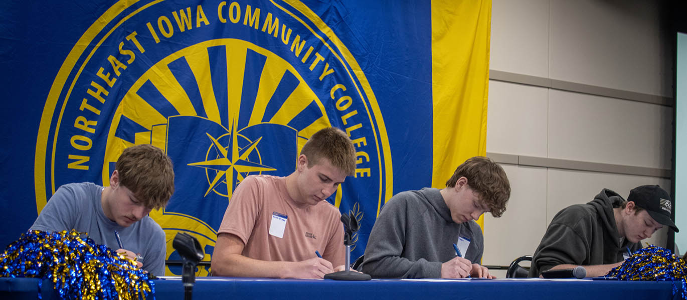 students sign letters of intent