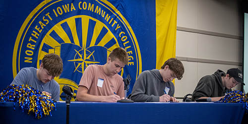 students sign letters of intent
