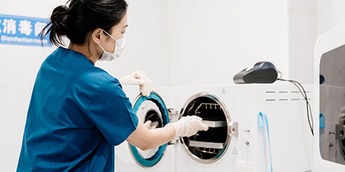 Sterile Processing Technician working in the lab